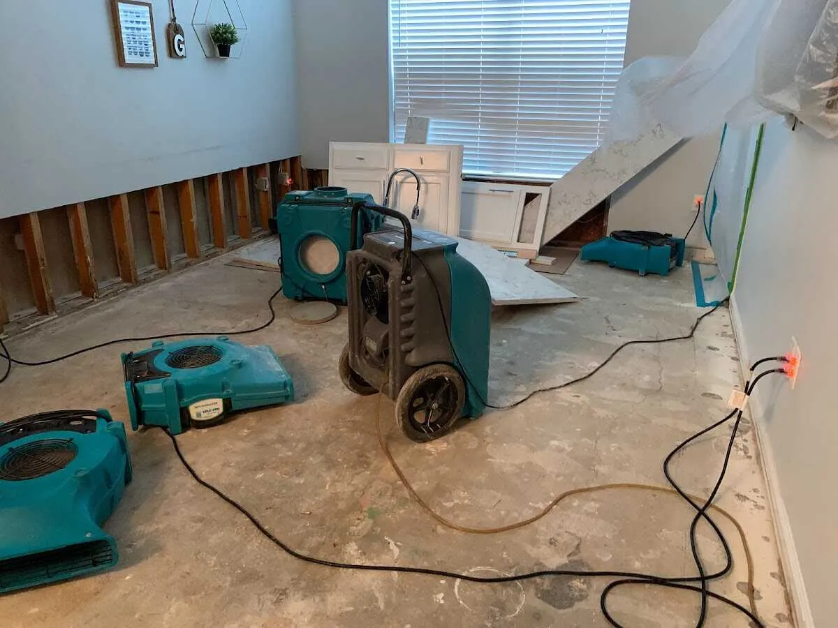 Dehumidifier in flood-cut room for Water Damage Restoration in Port Charlotte